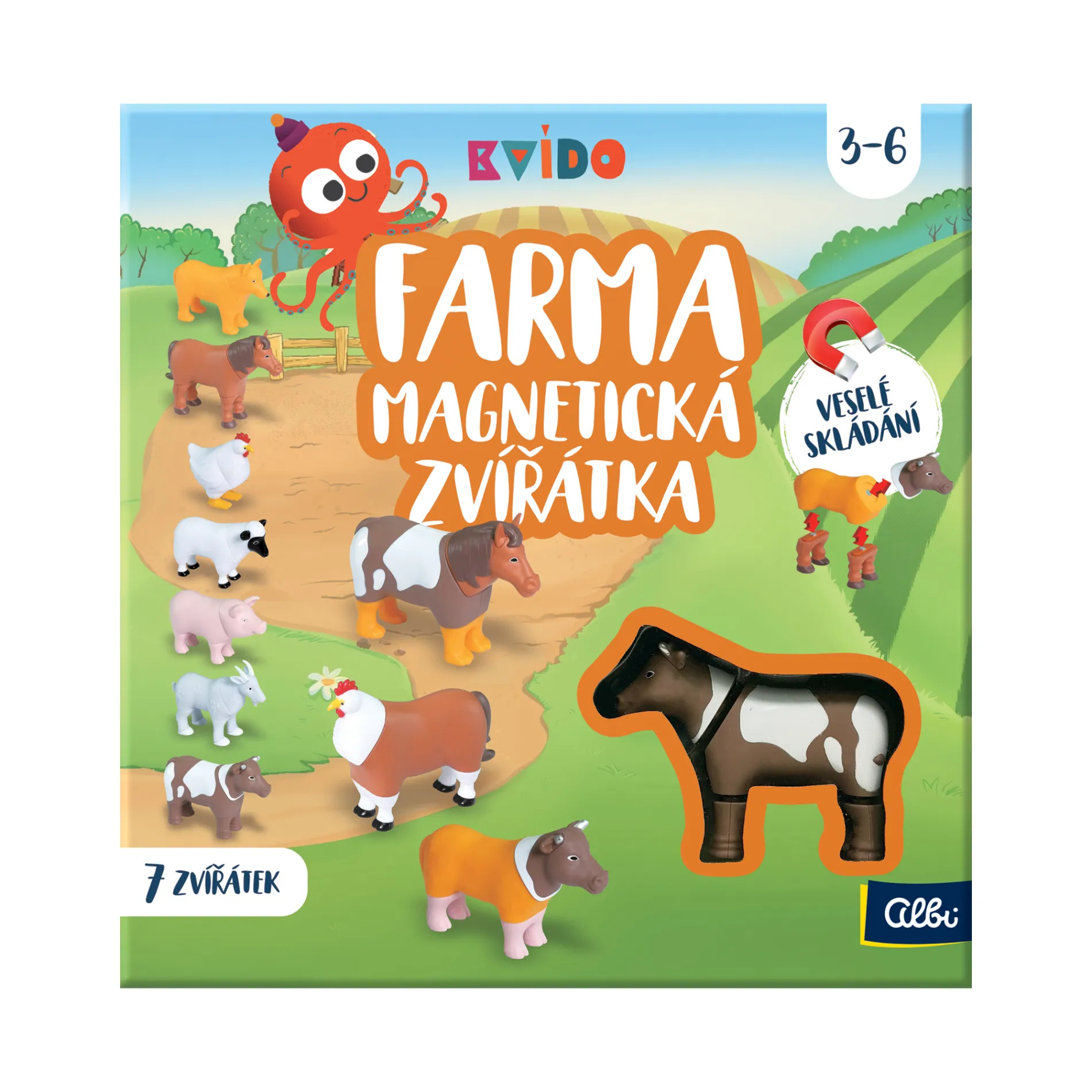 Detské ruky skladajúce magnetické dieliky zvieratiek z farmy.
