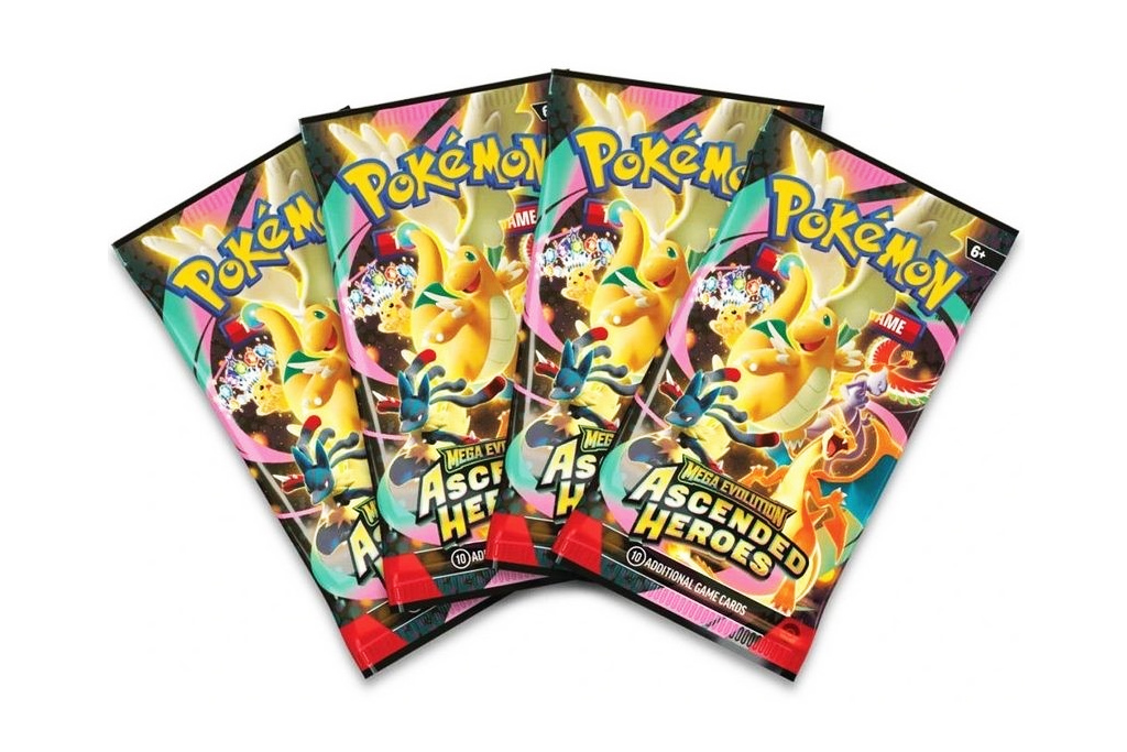 Opened booster packs spread out on a professional playmat