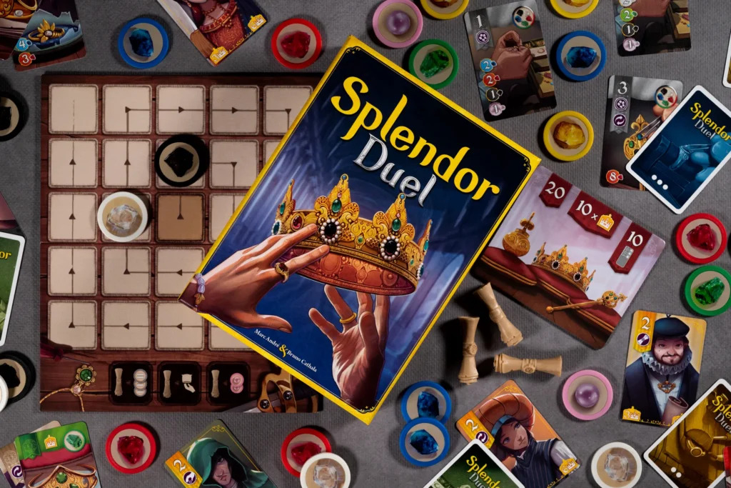Hráči soustředěně hrající Splendor Duel.