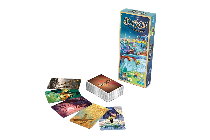 Players looking at new cards from the Dixit Anniversary expansion