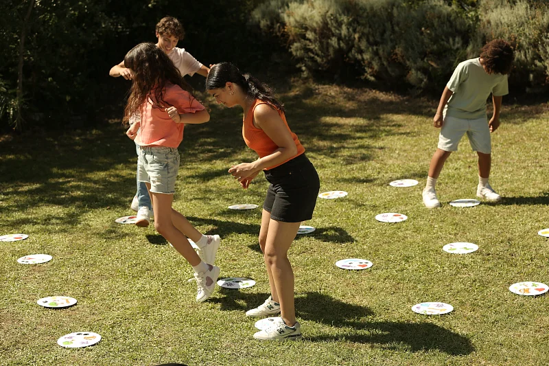 People playing Dobble Giant on the floor