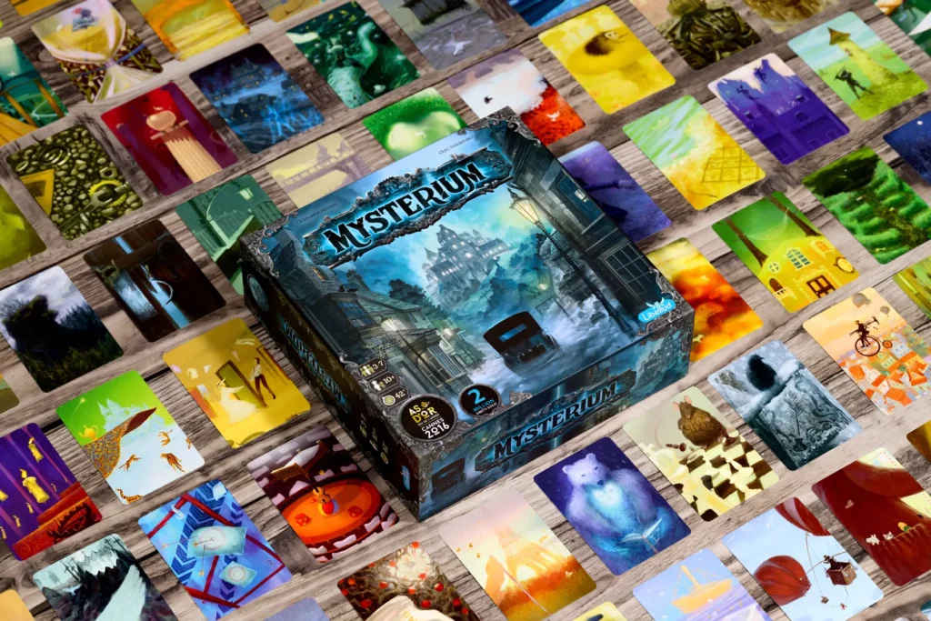 Players at a table studying vision cards during a game of Mysterium.