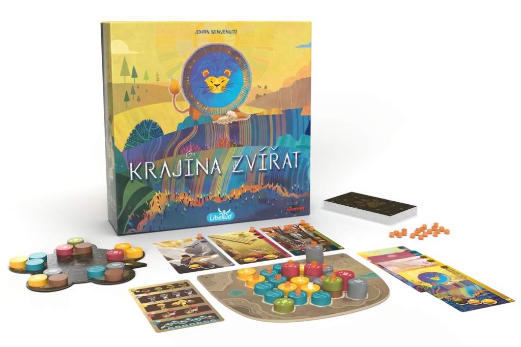 A player carefully placing a wildlife token onto a terrain tile.