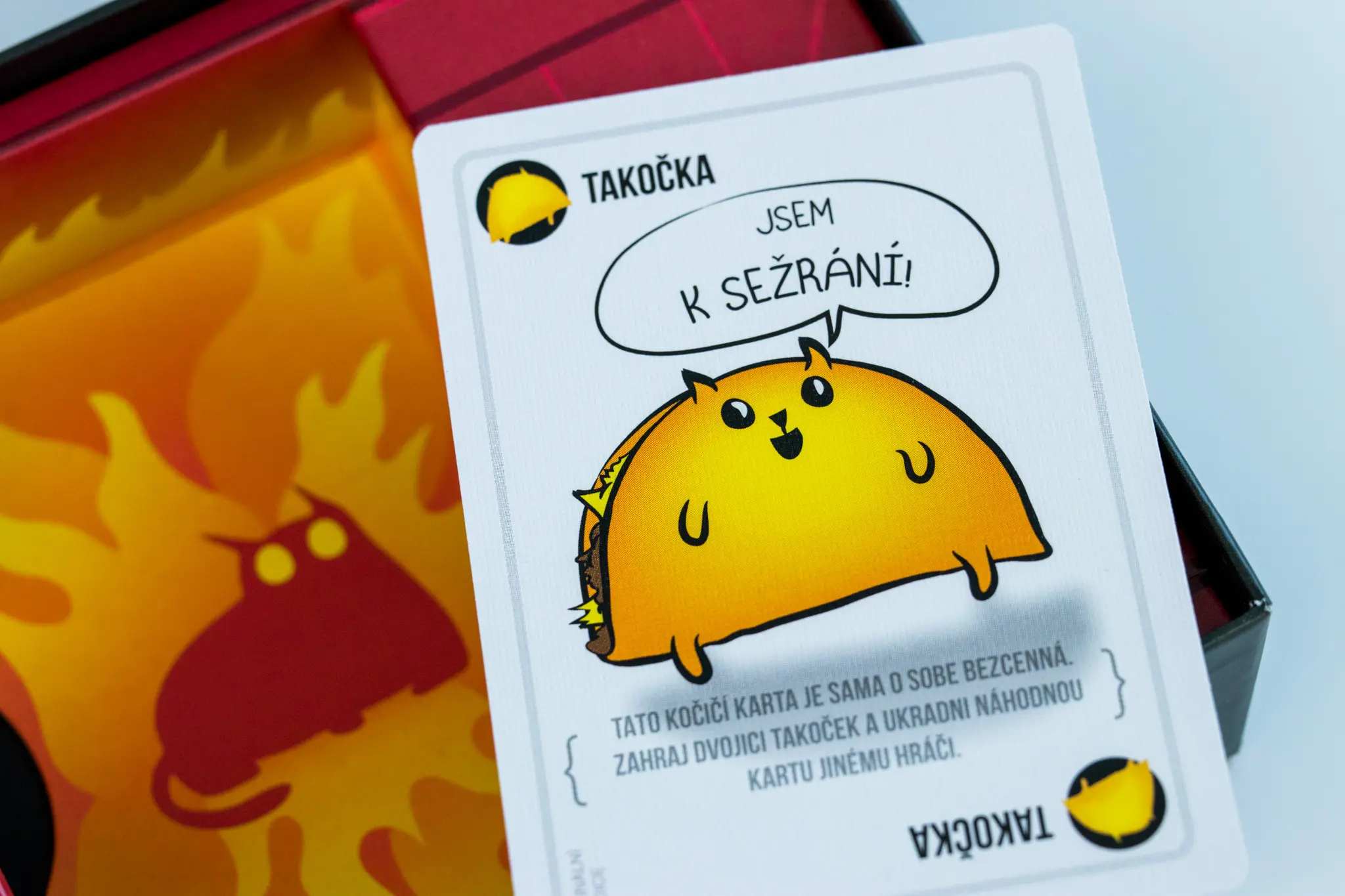 Card featuring a kitten defusal motif.
