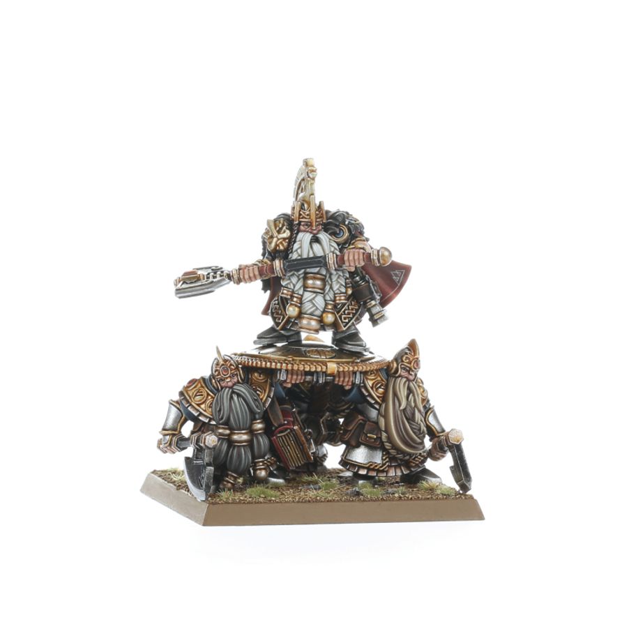 Multi-part plastic miniatures of Dwarf Lords, one elevated on a shield and one standing on foot