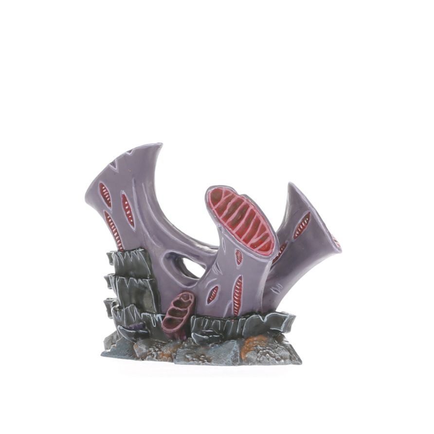 Close-up of Tyranid organic terrain accessories integrated into ruins.