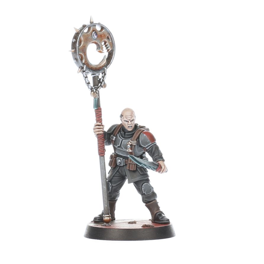 Close-up of Brood Brothers miniatures showing intricate detail