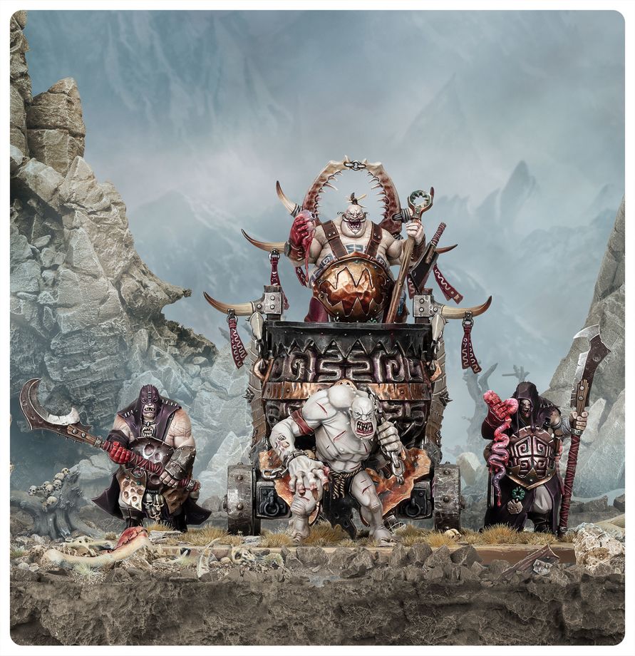 Redd the Maw on a wagon with a massive cauldron and three warriors